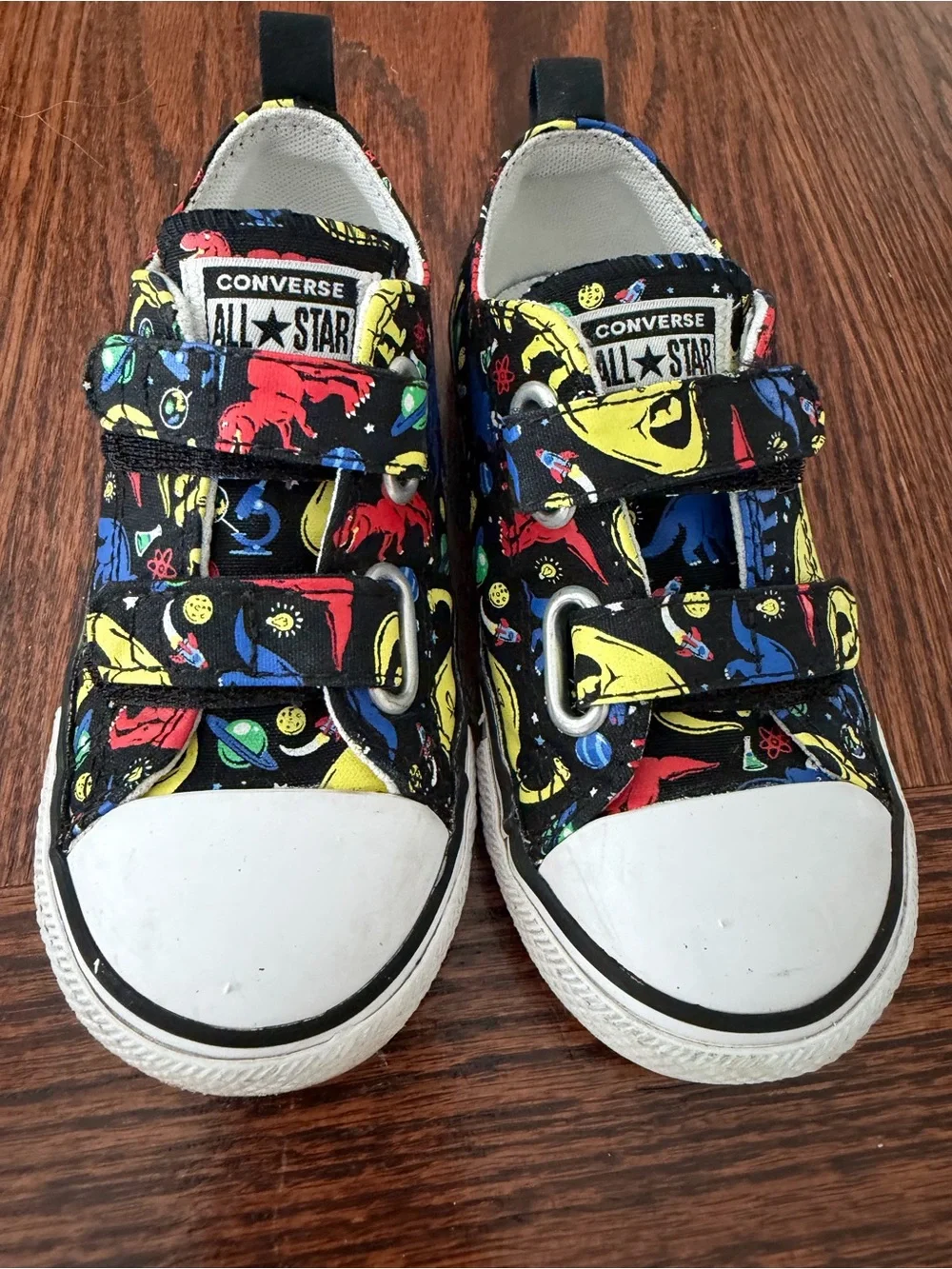 All Star Black with Multi Color Bright Dinosaurs on them Converses